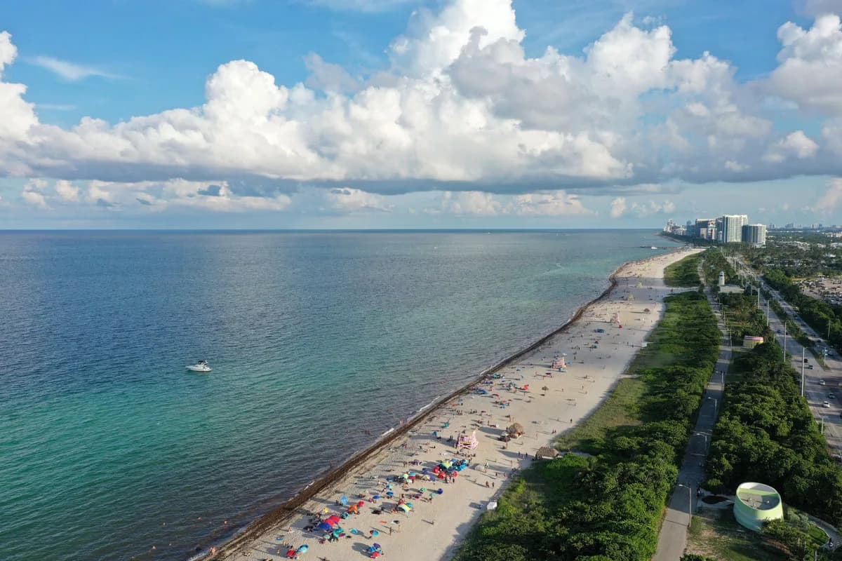 Aerial photograph of a crowded coastline, taken while flying a drone