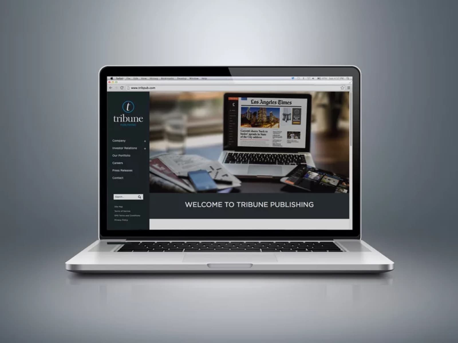 Tribune Publishing corporate website mockup on a laptop.