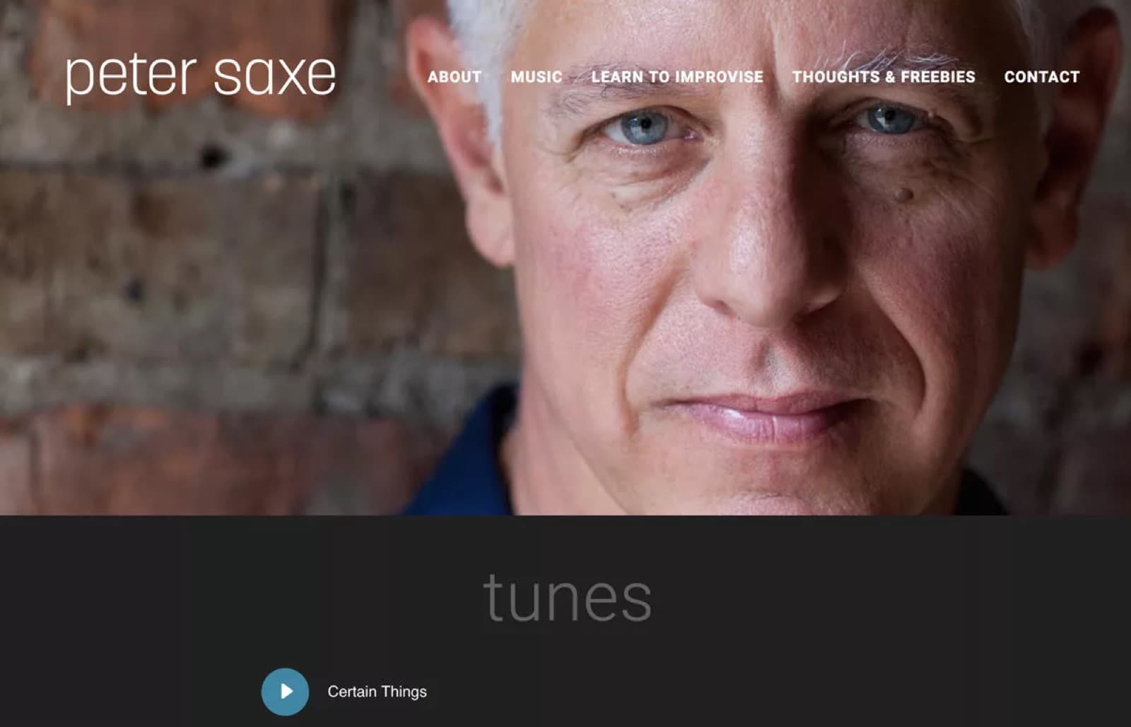 Peter Saxe Music e-learning website on a laptop.